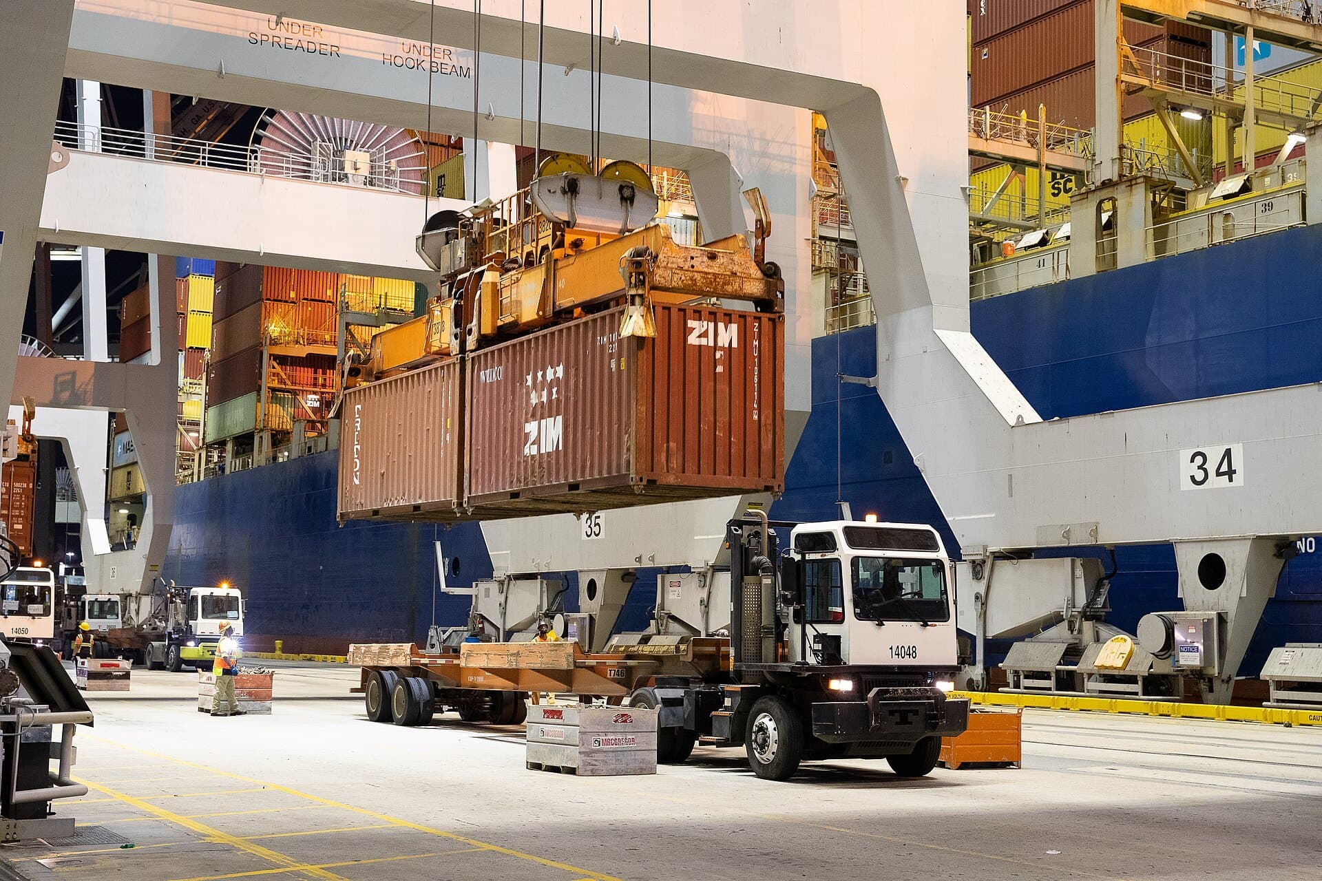 Quay cranes lift containers off a ship at the Port of Savannah, Georgia (CBP photo, 2021)