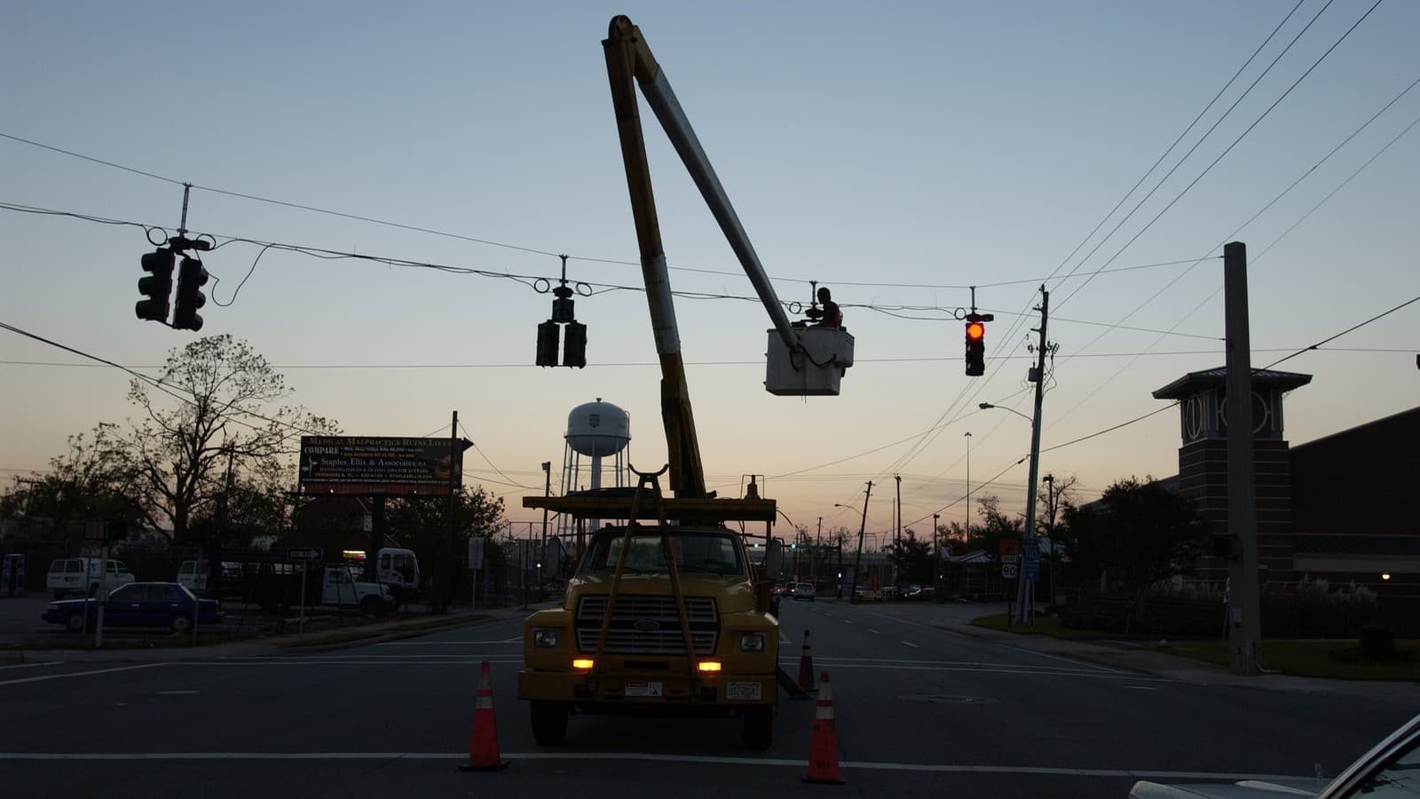 Utility crews work to restore power and street lights in Pensacola, Florida, after Hurricane Ivan, October 13, 2004 (FEMA file photo, illustrative; not Hurricane Isaias).