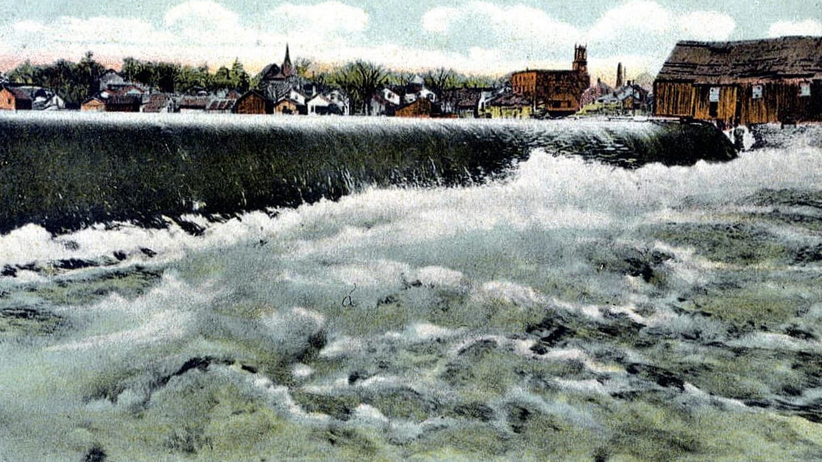 Vintage postcard view of the Oswegatchie River dam at Ogdensburg, New York. Photo: scanned by Dave Parker via Wikimedia Commons (Public domain).