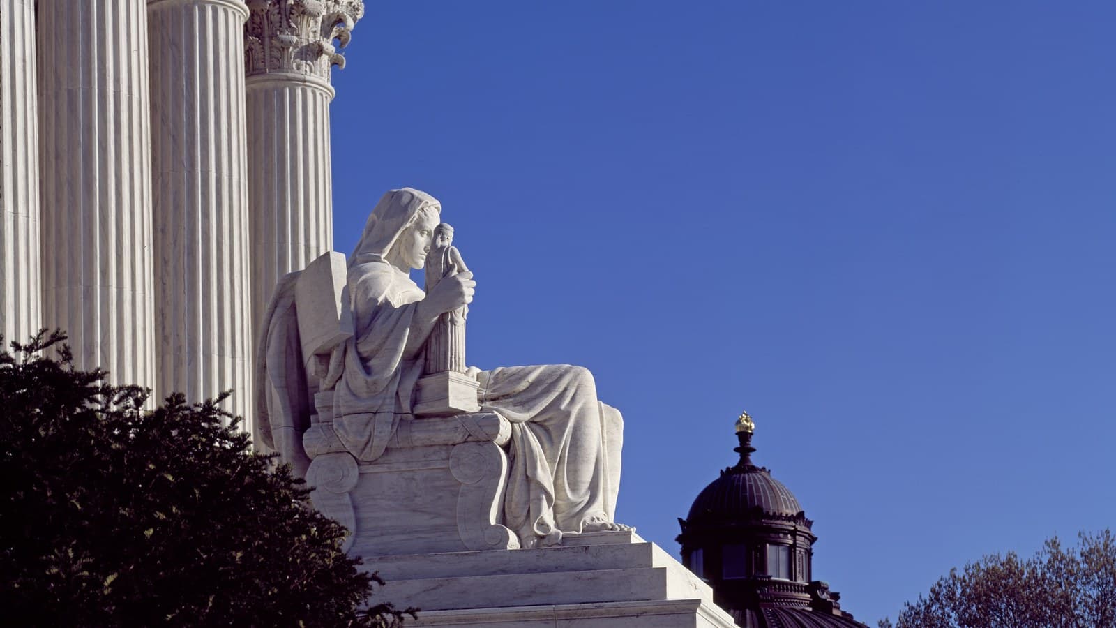 James Earle Fraser's statues outside the U.S. Supreme Court Building (file photo).